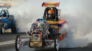 Illustration for article titled High Horsepower Drag Car Attempts To Navigate Road Course And Fails Miserably